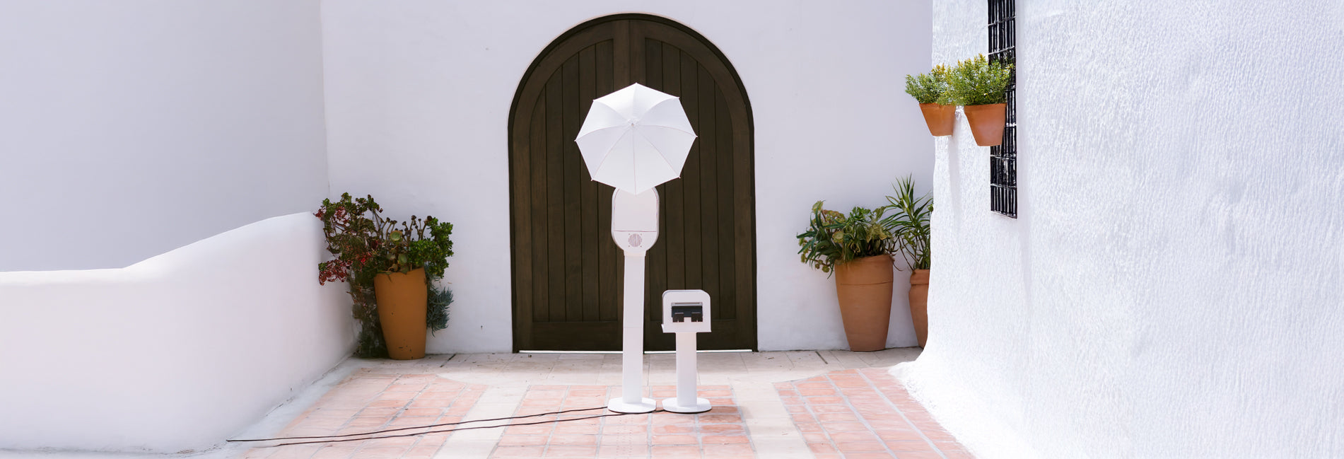 A Premium iPad Photo Booth in a Spanish-style courtyard