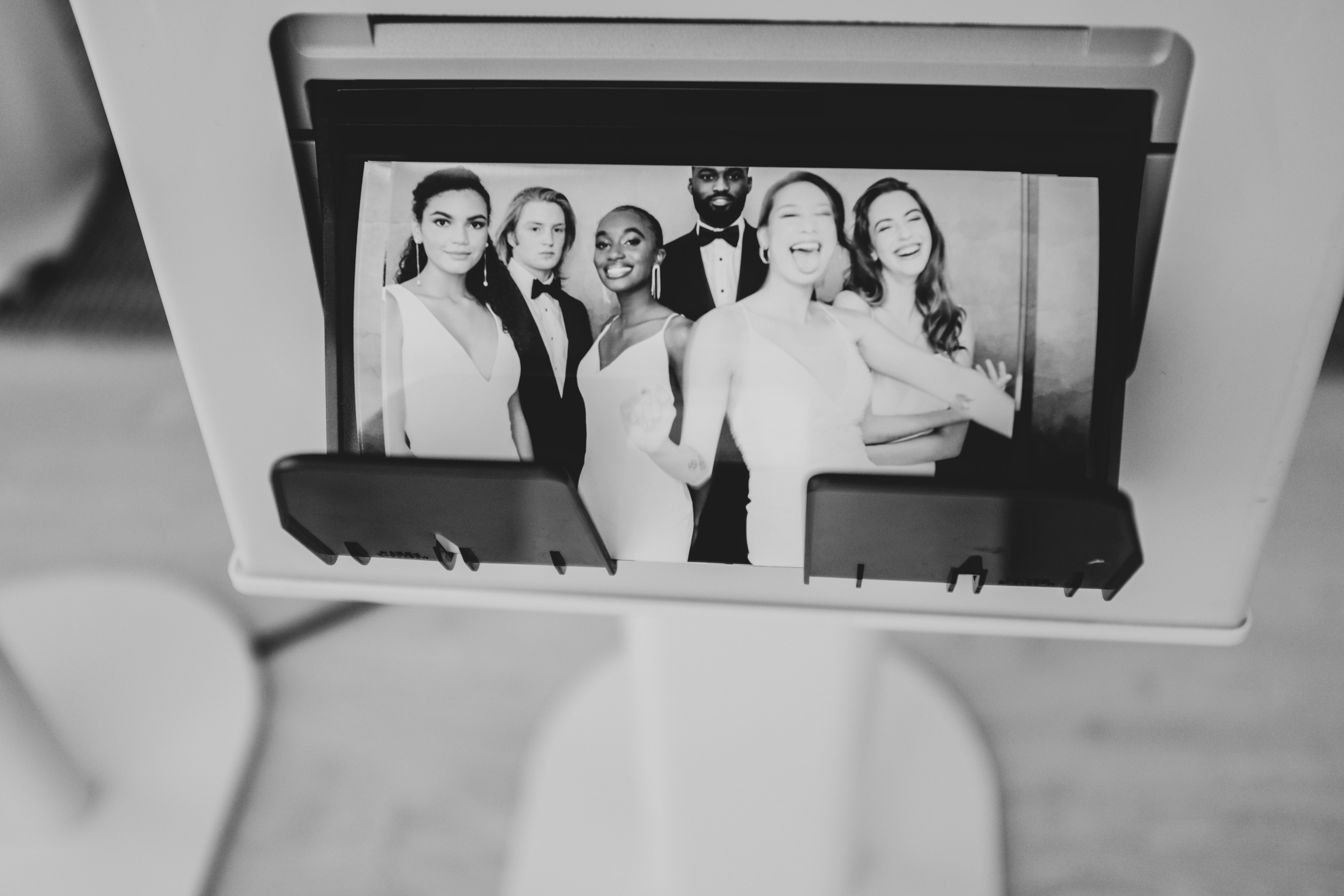 photo-booth-printer-with-wedding-photos