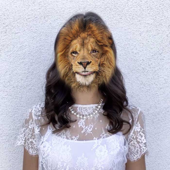 Preview of a photo booth user taking a capture with the lion mask
